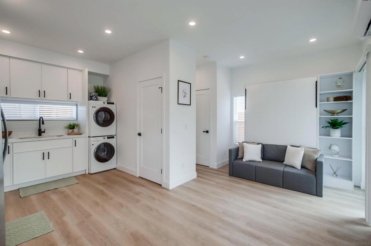 Finished studio living space with laundry at 63rd Street