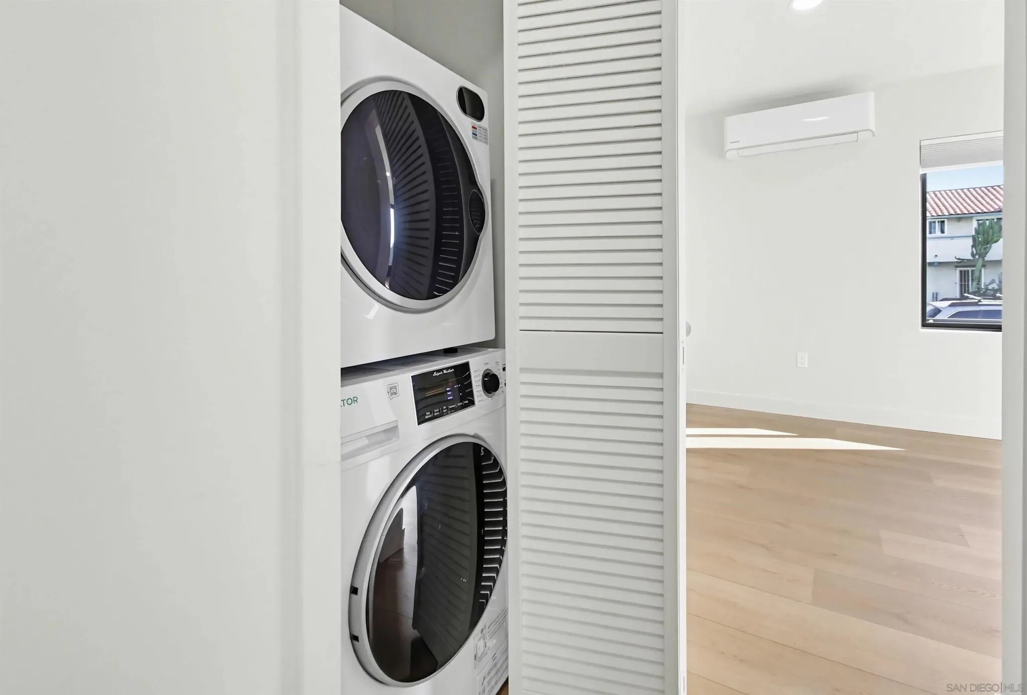 Built-in stacked laundry inside a Felton Street home