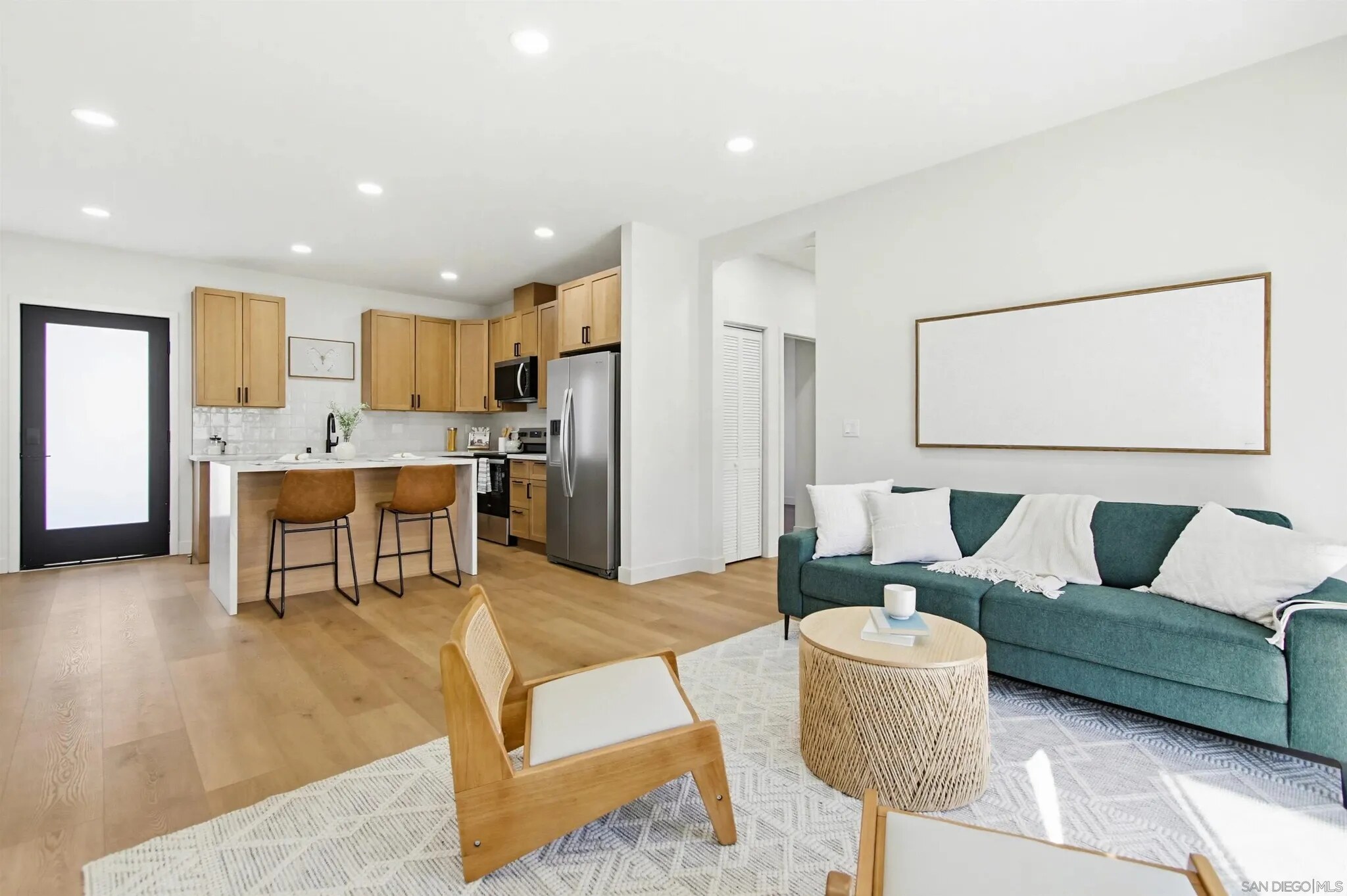 Open-plan living room and kitchen inside a Felton Street home
