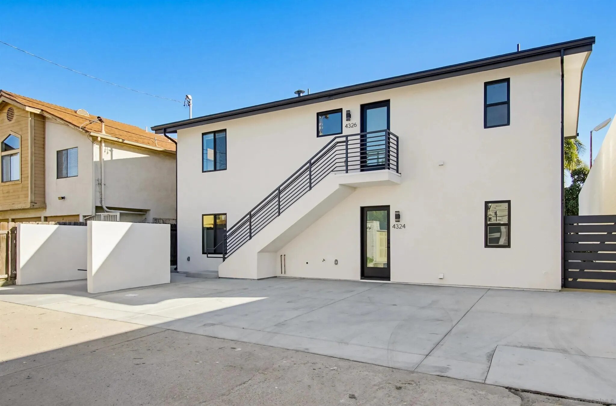 Completed two-story rear ADU building at Felton Street