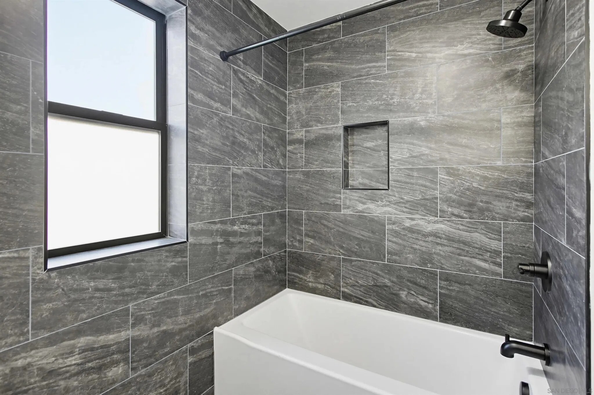 Completed gray tile bath and shower at Felton Street