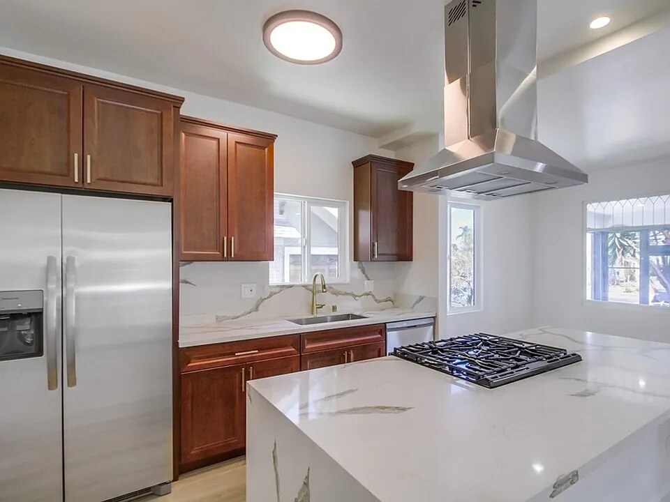 Renovated kitchen with quartz counters at Lincoln Avenue
