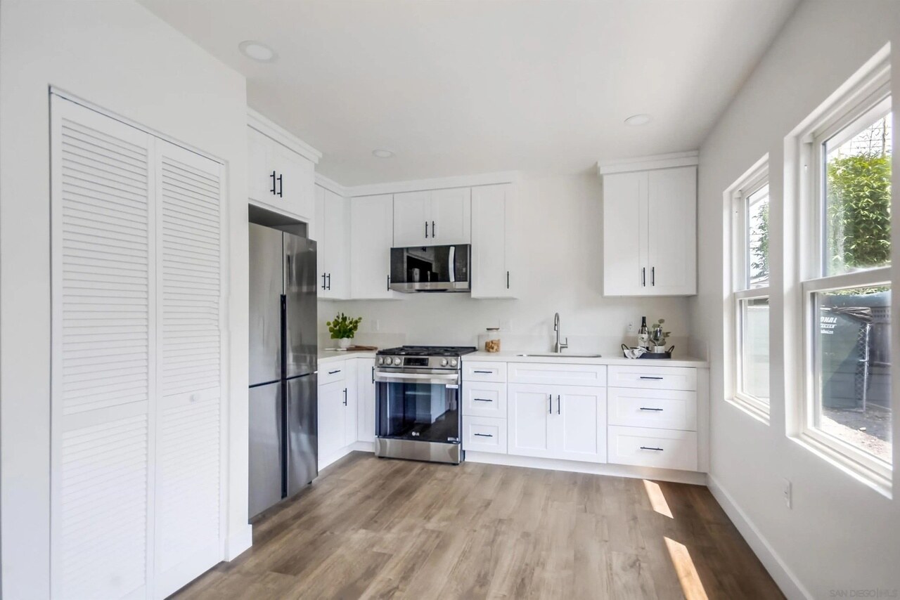 Completed white kitchen inside a Utah Street residence